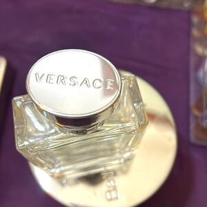 Empty Versace perfume bottle